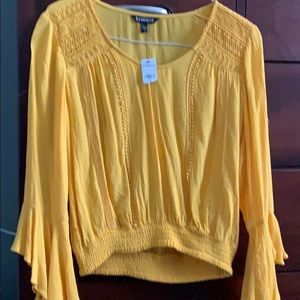 Express bell sleeve top